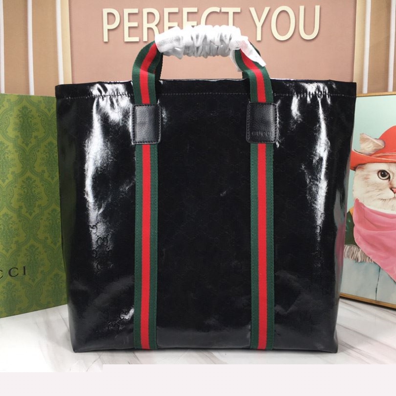 G*u*i shopping bags